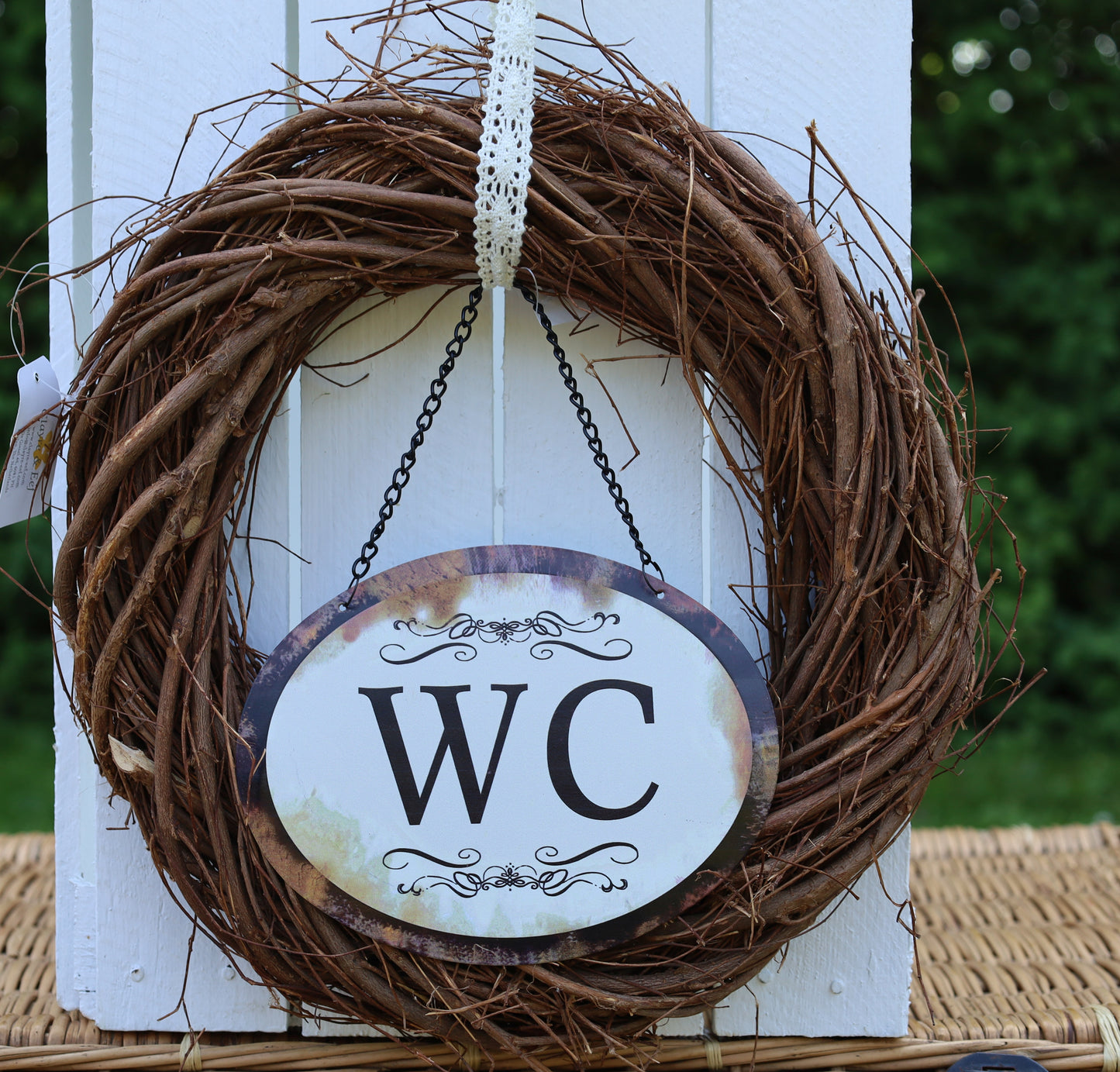 Cartello nostalgico per la porta del bagno degli ospiti