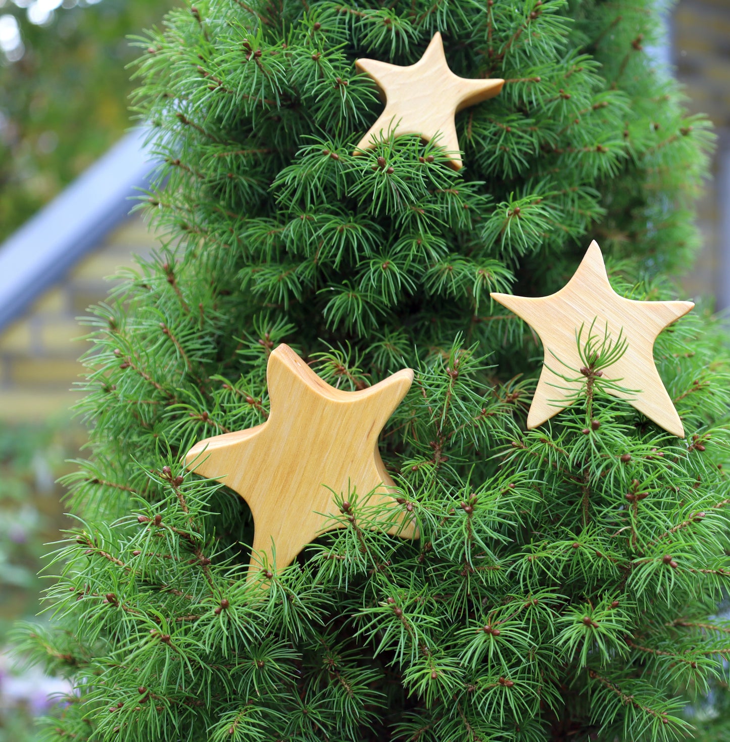 Asymmetrischer Holzstern aus Erle - Weihnachtsdeko Tannenbaumanhänger