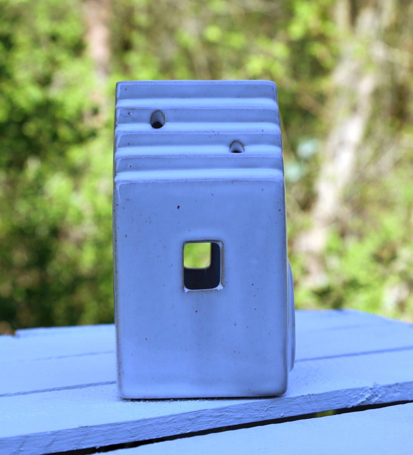 Ceramic tealight holder in the shape of a house