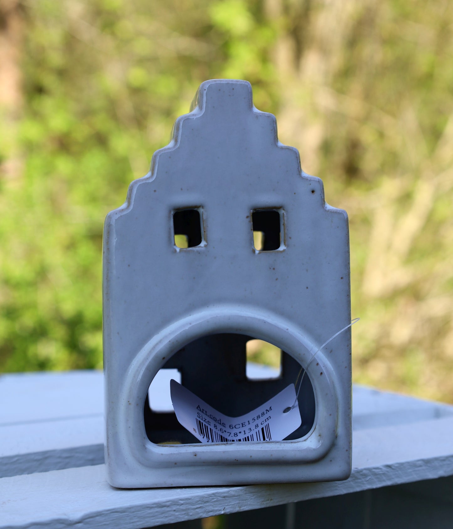 Ceramic tealight holder in the shape of a house