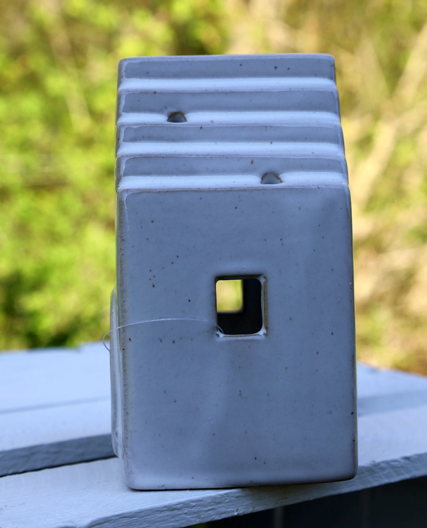 Ceramic tealight holder in the shape of a house