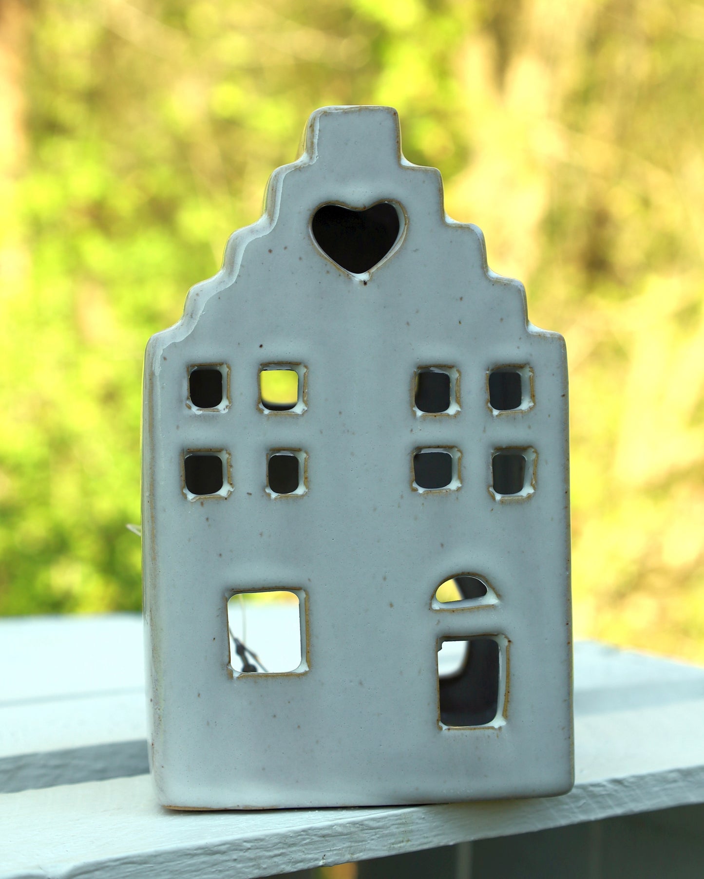 Ceramic tealight holder in the shape of a house