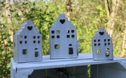 Ceramic tealight holder in the shape of a house