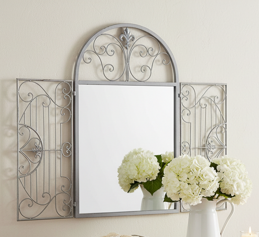 Specchio da giardino con elementi decorativi in ​​ferro battuto